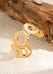 Unique Gold Tone Open Bangle