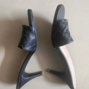 Chic Black Mules with sleek Heels