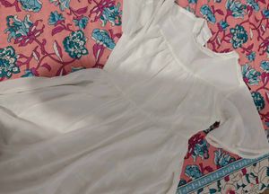 Chic White Mini Dress with Ruffle Sleeves