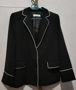 Chic Black Blazer with White Piping