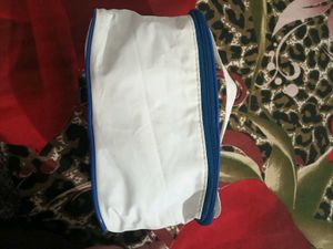 White Travel Pouch with Blue Trim