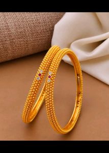 Elegant Gold Beaded Bangles with Stones