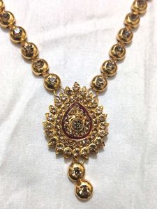 Gold neck piece