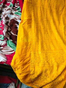 Yellow Chikankari Kurta Set.