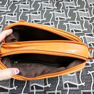 Orange Quilted Crossbody Bag