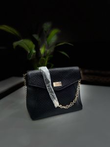 Leather Sling Bag.