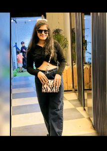 Stylish Black Cropped Top with denim jeans
