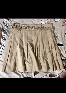 Khaki Pleated Skirt with Butterfly Detail