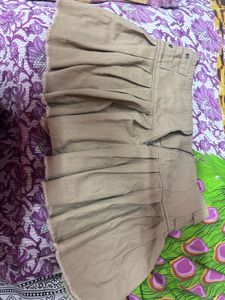 Tan Pleated Mini Skirt with Buckles