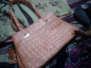 Chic Peach Textured Handbag