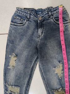 Distressed Blue Denim Jeans