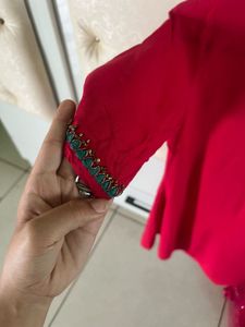 Elegant Ruby Red Kurti with embellished Sleeves