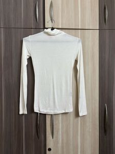 OZBRIDGE SHEER TURTLE NECK TOP