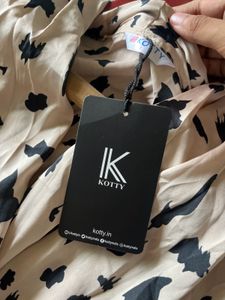 Kotty Cream &amp; Black Animal Print Top