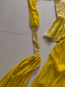 Stunning Yellow Sequined Lehenga Choli