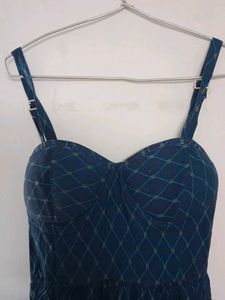 Blue Sweetheart neckline dress.