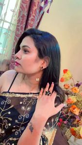 fancy black earrings and golden bracelet
