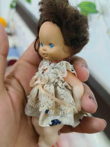 Vintage Doll with Brown Hair and Blue Eyes