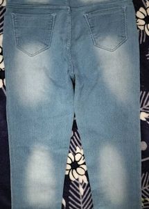 Ripped Light Wash Denim Jeans