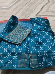 Beautiful Teal Saree with Intricate Gold Border