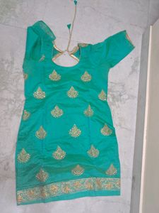 Turquoise teal color suit with Kundan