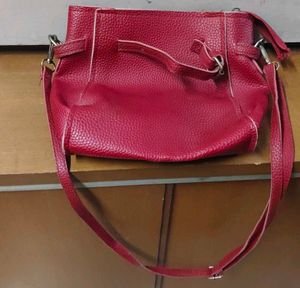 Red sling purse
