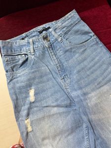 Ripped Wide Leg Denim Jeans