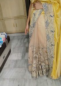 "Exquisite Net Silk Saree with Peacock Lace Design