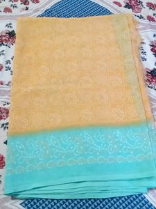 Beautiful orange and green Saree