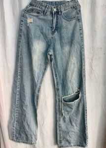 I. Light Wash Ripped Jeans