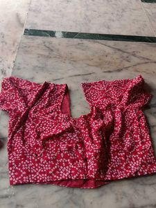 Vibrant Red Bandhani Saree with Intricate Designs