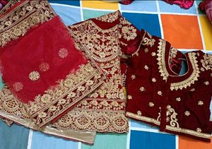 Exquisite Red &amp; Gold Embroidered Lehenga Choli