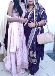 Pink naira Suit