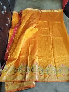 Elegant Orange Silk Saree with Floral Border