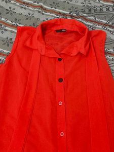 Vibrant Red Sleeveless Button-Up Top