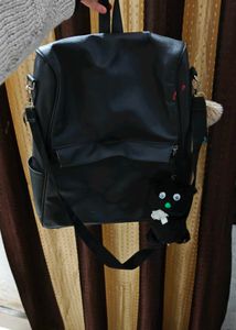 Stylish Black Backpack with Charm