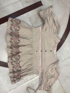 Embroidered Beige Peplum Top