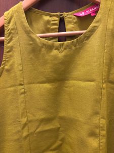 Yellow Sleeveless Kurta Set with Tassels