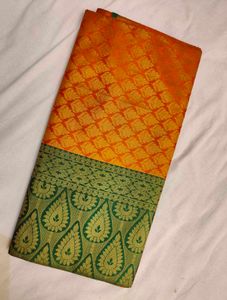Vibrant Orange & Green Silk Saree
