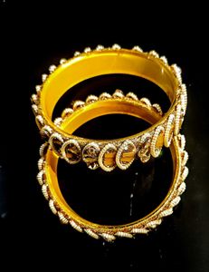 Elegant Gold Bangles with Stone Embellishments