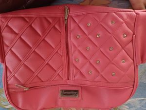 Quilted Pink Handbag with Embellishments