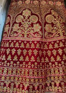 Exquisite Red Velvet Lehenga with Golden Embroider