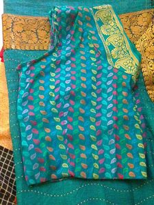 Teal Saree with Golden Border