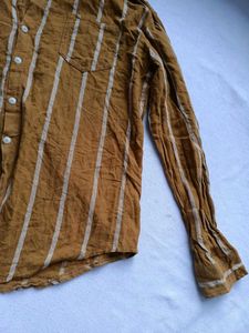 Men's brown lined button up shirt