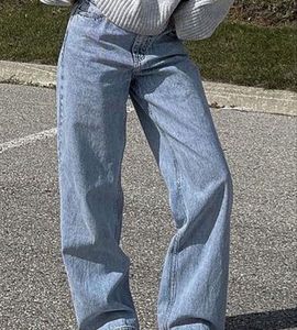 straight light blue jeans with little dark blu