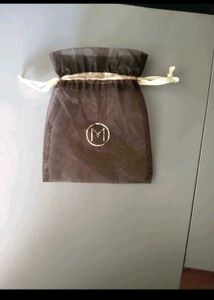 malabar gold n diamonds drawstring potli with logo