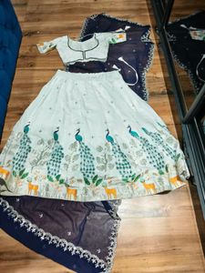 sequined embroidered lehanga choli peacock pattern
