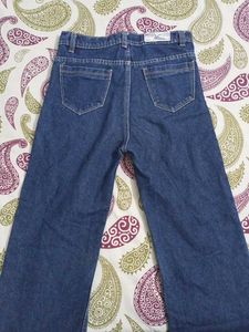 Distressed Blue Denim Jeans