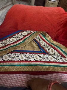 Red Designer Saree with Heavy Embroidered Border