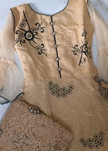 Elegant Beige Embroidered Gown